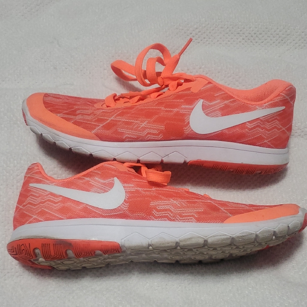 Nike Women's Bright Coral Lace-Up Running Sneakers with White Swoosh